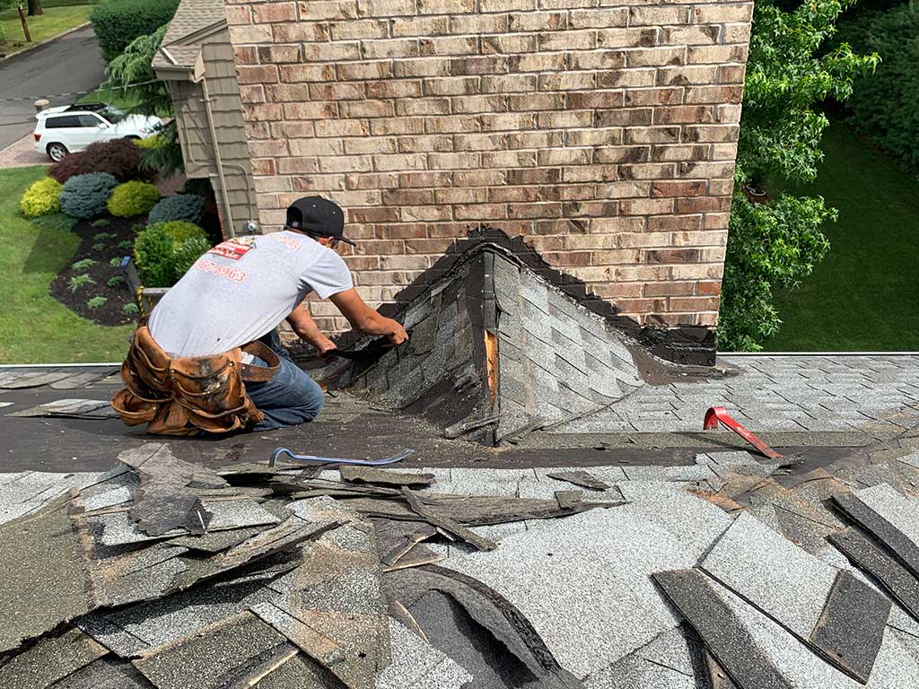 Removal of Old Aluminum Roof Flashing in Hoboken, NJ